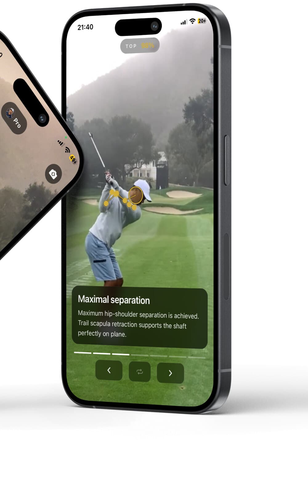 The app showing coaching text over a frame at the top of the backswing